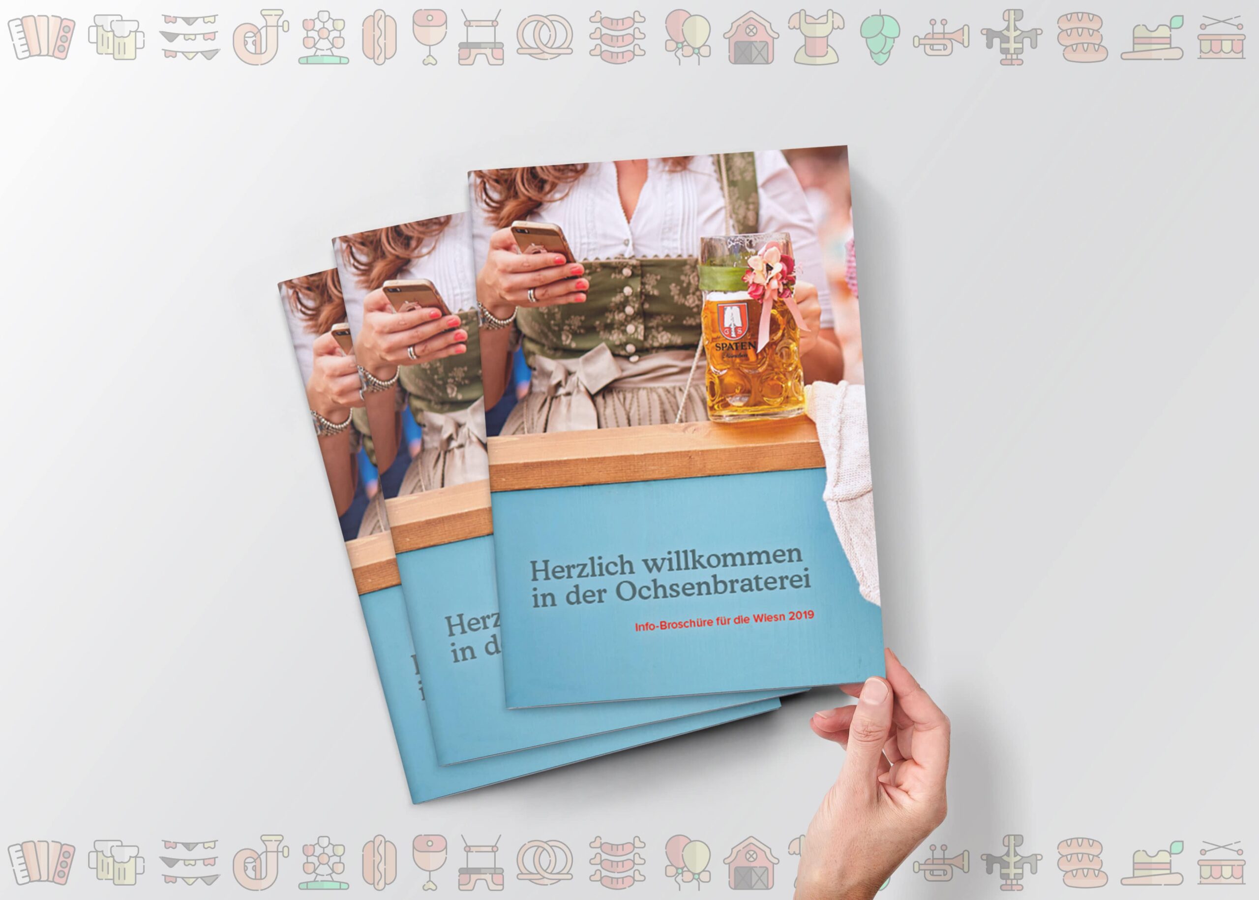 Für das Oktoberfest in München sollten wir eine Broschüre erstellen. Hier dargestellt sind drei Ausgaben der Servicebroschüre für die Ochsenbraterei München.